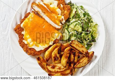 Chicken Parmo, Chicken Breast Cutlet Deep-fried In Breadcrumbs, Slathered With Bechamel Sauce And Me