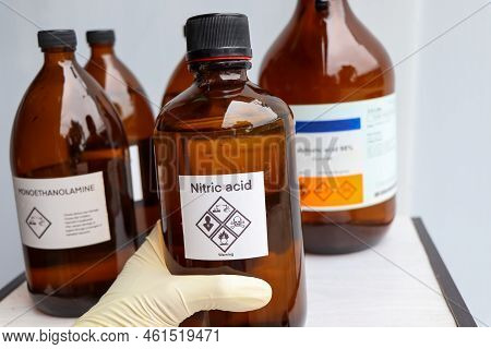 Nitric Acid In Bottle, Chemical In The Laboratory And Industry
