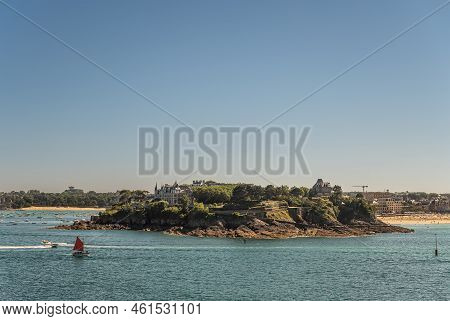 St. Malo, Brittany, France - July 8, 2022: Rocky And Green Foliage Peninsula Head Pointe Du Moulinet