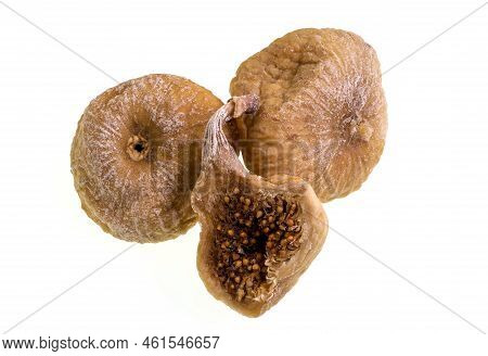 Delicious And Healthy Dried Figs Isolated On A White Background