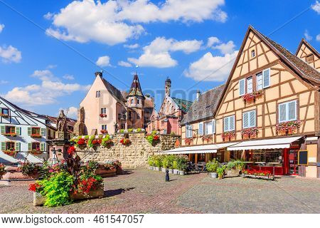 Eguisheim, France. Colorful Half-timbered Houses In Castle Square, Alsace.