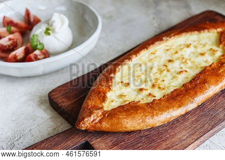 Traditional Turkish Baked Pide Dish. Middle Eastern Snacks. Turkish Pizza. Turkish Pide With Cheese 