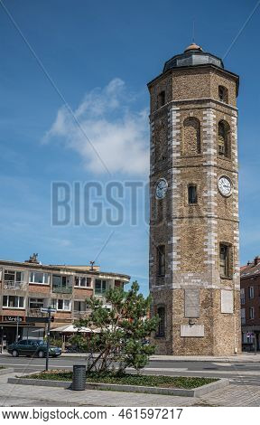 Europe, France, Dunkerque - July 9, 2022: Closeup Of Brown Stone Historic Clock Tower Called Le Leug