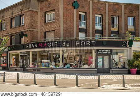 Europe, France, Dunkerque - July 9, 2022: Closeup Of Large Pharmacie Du Port On Corner Of Rue Jean J