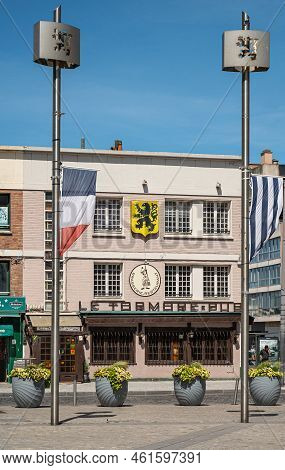 Europe, France, Dunkerque - July 9, 2022: Facade Of Le Tormore Pub With Black Lion On Yellow Field A