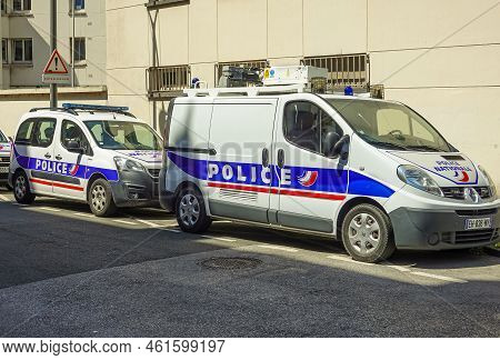 Europe, France, Dunkerque - July 9, 2022: Closeup Of Blue And Red On White Painted Police Can And Va