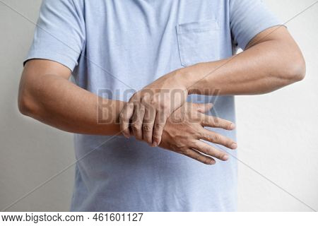 Man Hand Massage Physiotherapy Wrist Is Sore And Numb, Exhausted, Tingling. Guillain-barre Syndrome,