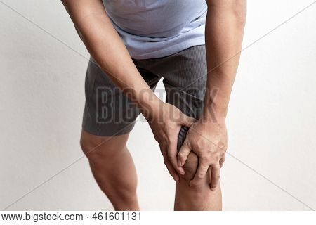 Man Hand Massage Physiotherapy Her Knee Is Sore And Numb, Exhausted, Tingling. Guillain-barre Syndro
