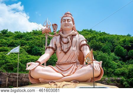 Hindu God Shiva Sculpture Sitting In Meditation. Yoga And Meditation Concept.