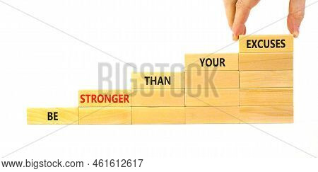 Be Stronger Symbol. Concept Words Be Stronger Than Your Excuses On Wooden Blocks On A Beautiful Whit