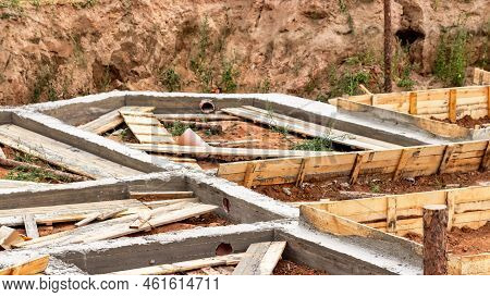 Dismantling The Strip Foundation Formwork At The Construction Site. Dismantling Of Wooden Formwork P