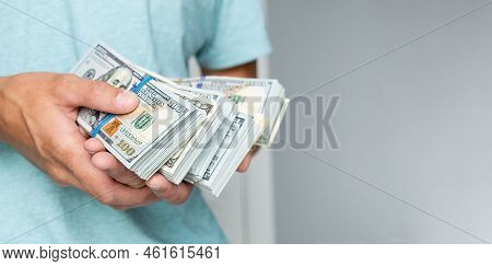 Man Of Hundred Dollar Bills Close Up. Stock Market Financial Illegal Freedom Exchange Earn Pile Rich