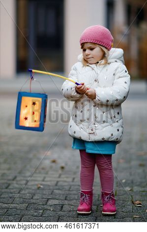 Little Kid Girl Holding Selfmade Lanterns With Candle For St. Martin Procession. Healthy Cute Toddle