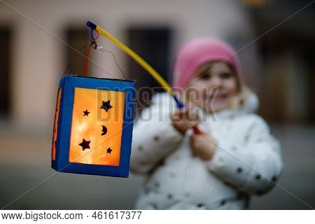 Close-up Of Little Kid Girl Holding Selfmade Lanterns With Candle For St. Martin Procession. Healthy