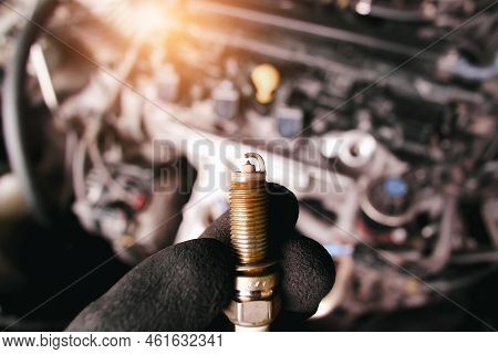 Close Up Of Car Iridium Spark Plugs Damaged By Heavy Use Of The Car Engine Ignition System, Engine C