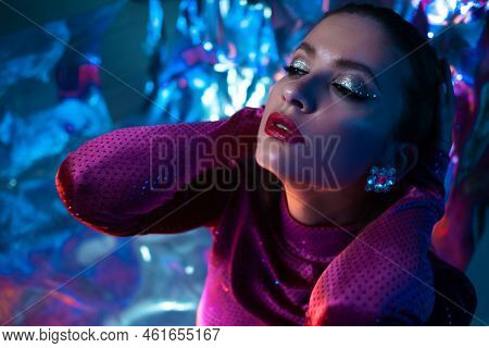 Portrait Of A Young Beautiful Woman On A Shimmering Background, Iridescent Colored Light, Futuristic