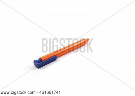Orange And Blue Plastic Pen Isolated On White
