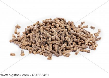 Sunflower Granulated Feed  On White Background, Close-up. Pile Of Sunflower Meal Pellets On White Ba