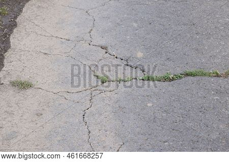 Cracked Asphalt Of A Country Road In Germany