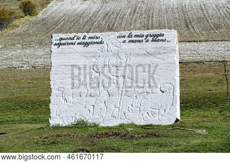 Castellugio, Italy - October 20, 2021: Sculpture With Poem Of Leopardi  In The Alpine Region Of Ital
