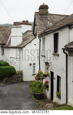 Facade Of A White Buildings In The Village Of Hawkshead In The South Lakeland, England, Uk
