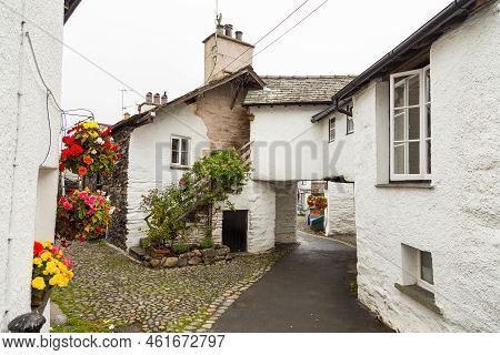 Facade Of A White Buildings In The Village Of Hawkshead In The South Lakeland, England, Uk
