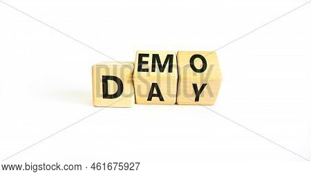 Demo Day Symbol. Concept Words Demo Day On Wooden Cubes. Beautiful White Table White Background. Bus