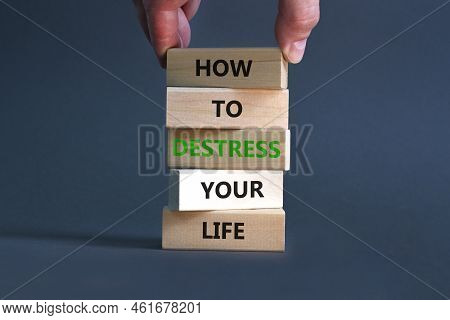 Destress Your Life Symbol. Concept Words How To Destress Your Life On Wooden Blocks. Doctor Hand. Be