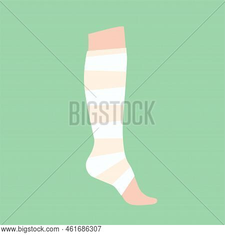 Elastic Bandage On Human Leg. Roll And Wrap Medical Gauze Over A Foot. Broken Or Injured Ankle. Heal