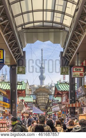 Tokyo, Japan - January 28 2022: Tourists Walking In The Nearby Shin-nakamise Covered Arcade Shopping