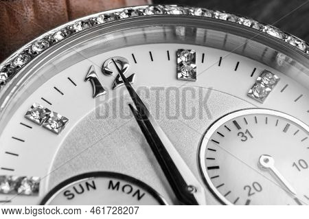 Midnight Time. The Hands Of The Clock Show Twelve. The Clock Is Midnight. Its Noon On The Clock.
