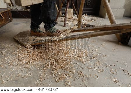 Shallow Depth Of Field (selective Focus) Details With A Craftsman Using An Ancient Roman Woodturning
