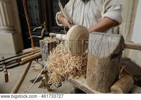 Shallow Depth Of Field (selective Focus) Details With A Craftsman Using An Ancient Roman Woodturning