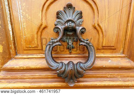 European Vintage Old Metal Wrought Iron Door Knocker. Design Detail. Paris.