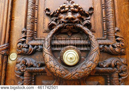 European Vintage Old Metal Wrought Iron Door Knocker. Design Detail. Paris.