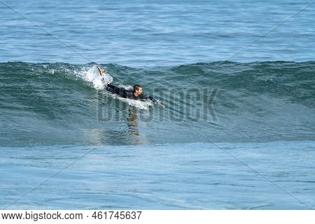 Surfer Riding Waves