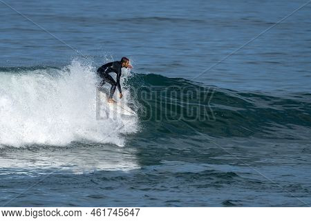 Surfer Riding Waves