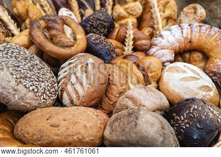 Top View Of Assortment Of Different Kind Of Cereal Bakery: Bread, Pasties, Buns, Pretzel