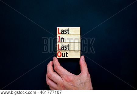 Lilo Last In Last Out Symbol. Concept Words Lilo Last In Last Out On Wooden Blocks. Beautiful Black 