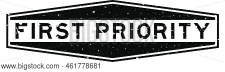 Grunge Black First Priority Word Hexagon Rubber Seal Stamp On White Background