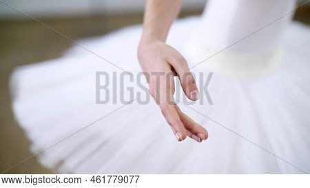 In Ballet Hall, Young Ballerina Performs Allonge, Moving Hand Elegantly , Close-up