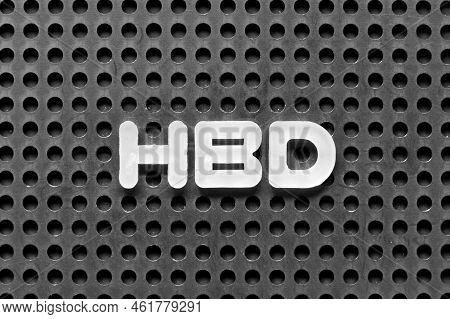 White Alphabet Letter In Word Hbd (abbreviation Of Happy Birthday) On Black Pegboard Background