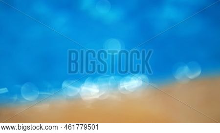 Close-up, Focus In Blur, Two Elements, Water And Sand In Sunlight, Reflections