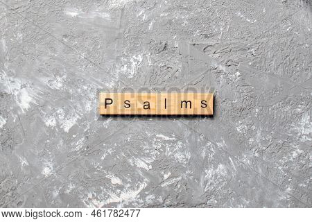 Psalms Word Written On Wood Block. Psalms Text On Table, Concept.