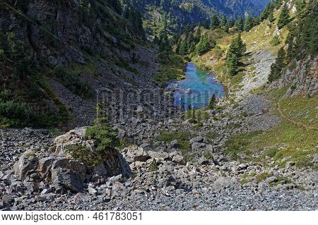 Landscape Of Forests And Mounts Around Leama Lake In Belledonne Mountain Range