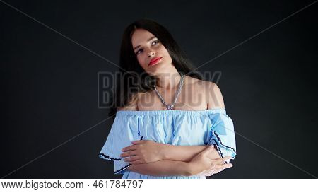 Portrait Of A Sexy Brunette Woman With Red Lips Who Eroticly And Playfully Moves And Looking Sexuall
