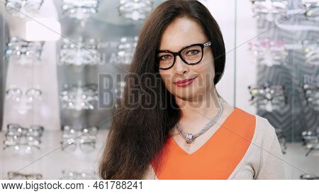 Sexy Beautiful Woman Staring At Camera. Portrait Of Smiling Female Customer Wearing Spectacles In Op