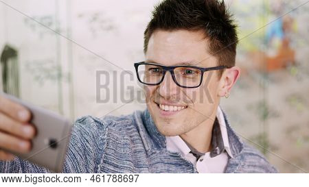 Sexy Handsome Young Man In Glasses, Spectacles Makes Selfie At Optical Store, Optics, Optician Retai