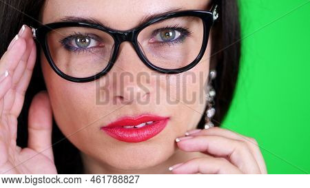 Green Background, Chromeakey. Portrait Of A Sexy Brunette Woman With Red Lips, In Stylish Glasses, S