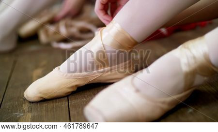 Close Up, Ballerinas Change Their Shoes Into Special Ballet Shoes, Pointe Shoes, Lace With Ballet Ri